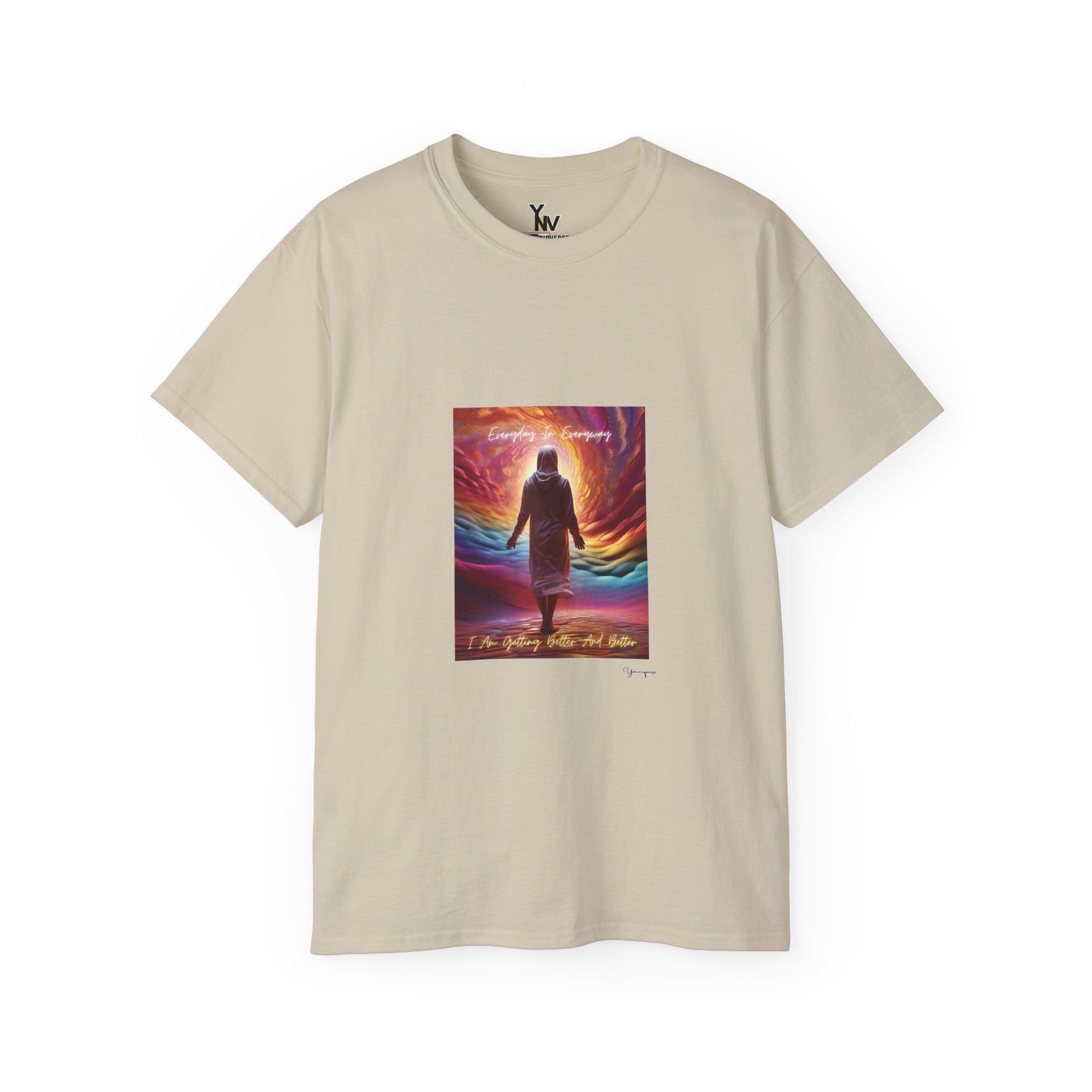 Sand unisex t-shirt with a person in white attire on cloudy rainbow with positive quote Everyday In Every Way I Am Getting better And Better, Peaceful Rainbow 3 by Youniqverse